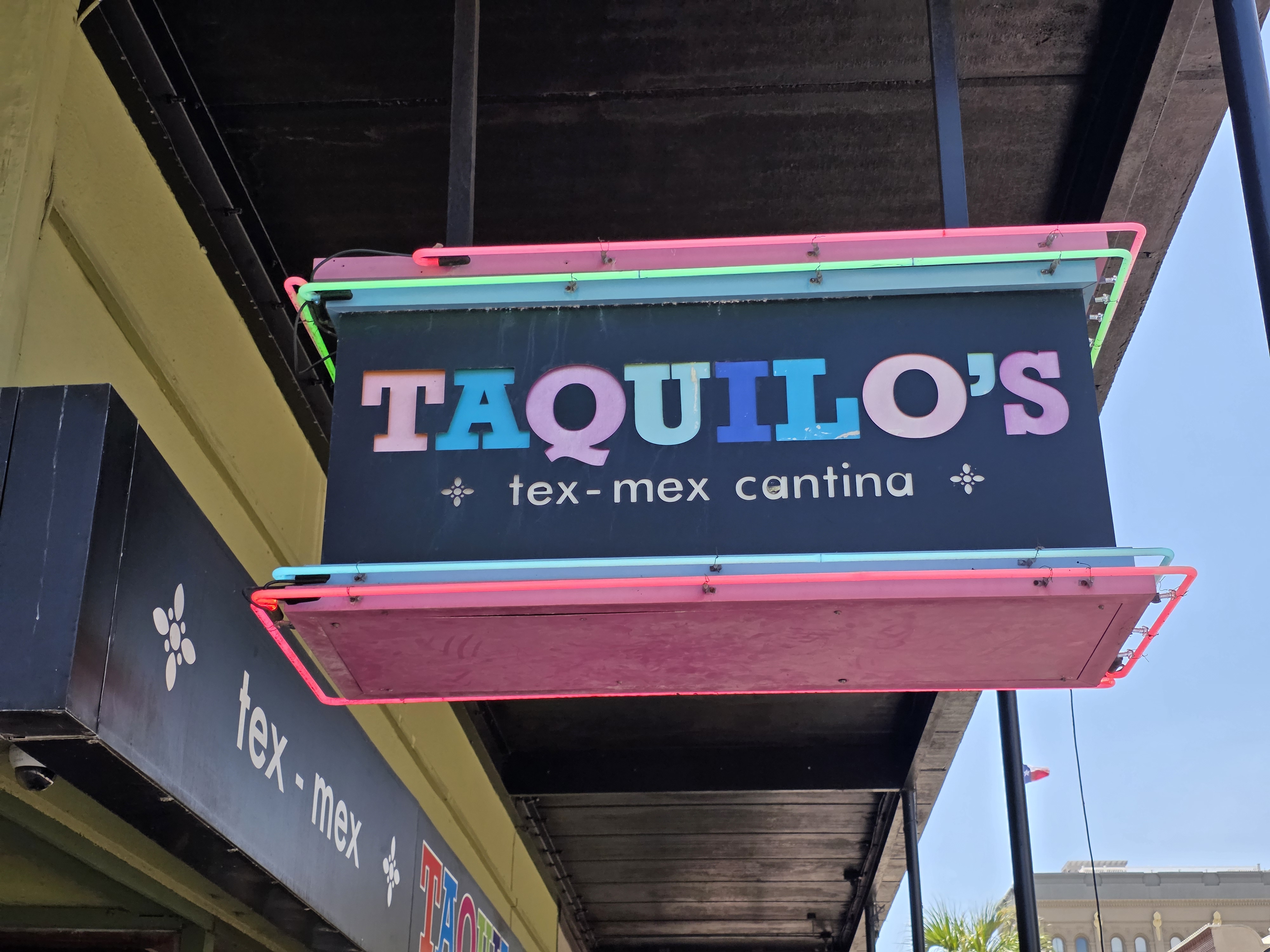 Taquilo's Cantina — Neon-Framed Blade Sign
